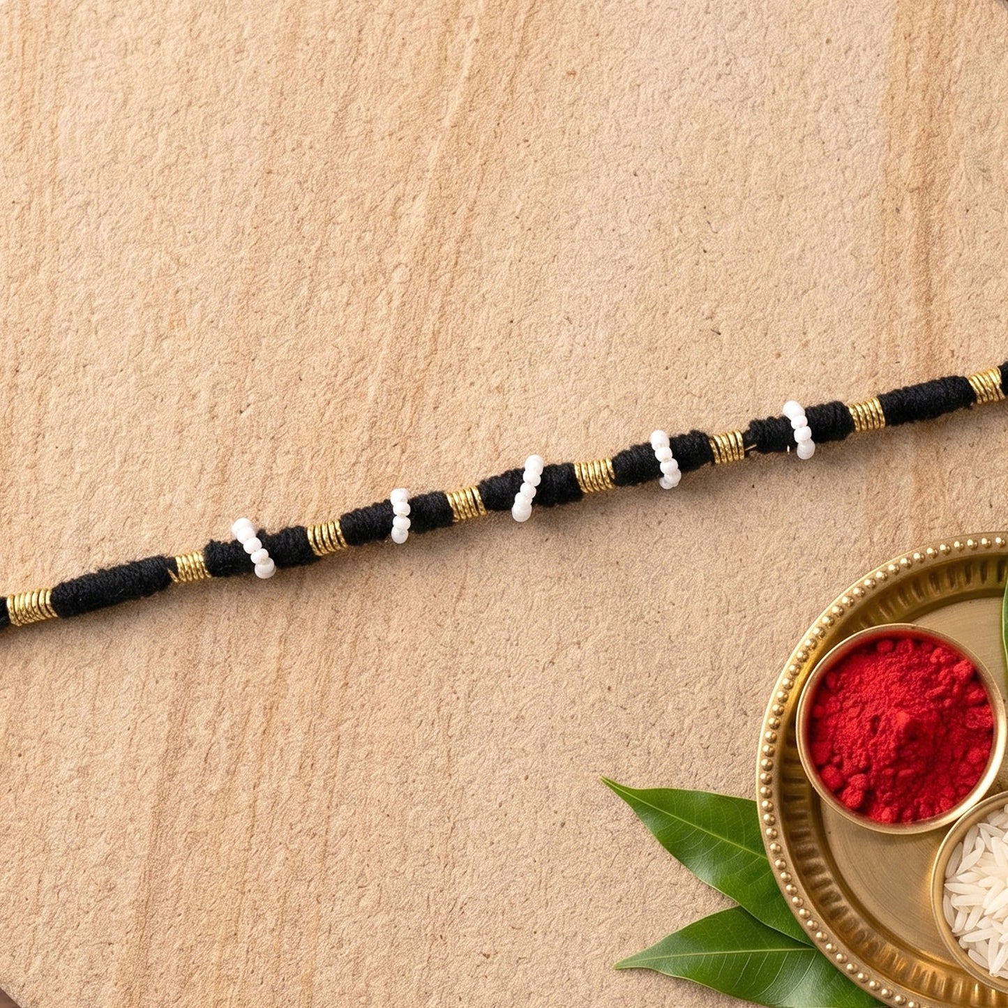 Handmade Pearl Beaded Rakhi – Traditional Ethnic Thread for Festivities