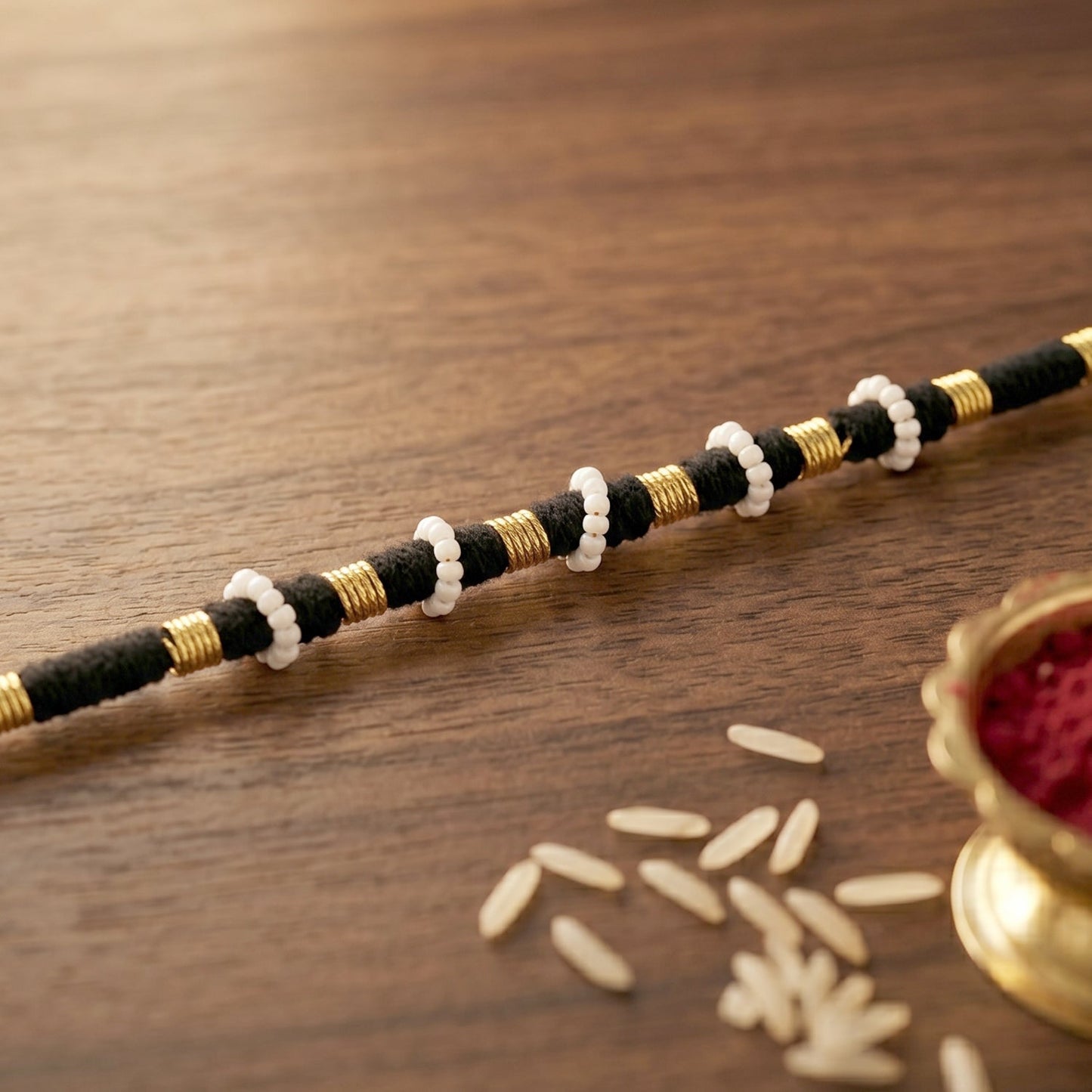 Handmade Pearl Beaded Rakhi – Traditional Ethnic Thread for Festivities