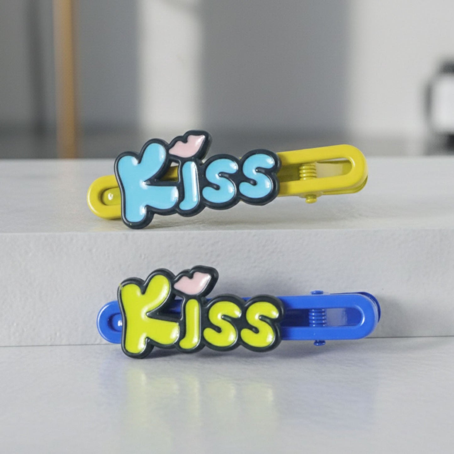 Kiss Text Hair Clip Set – Cute & Playful 2-Piece Snap Clips